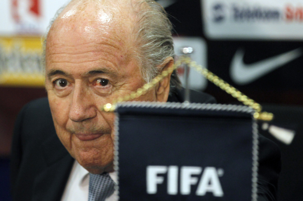FIFA President Joseph S. Blatter addresses during a press conference in Stara Pazova, Serbia, Wednesday, June 12, 2013. Blatter is on a one-day visit to Serbia. (AP Photo/Darko Vojinovic)
