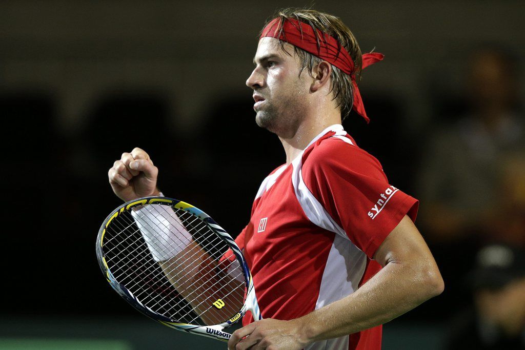 Michael Lammer of Switzerland reacts after winning a game to Roberto Quiroz of Ecuador, during the third single match of the Davis Cup World Group Play-off round match between Switzerland and Ecuador, in Neuchatel, Switzerland, Sunday, September 15, 2013. (KEYSTONE/Salvatore Di Nolfi)