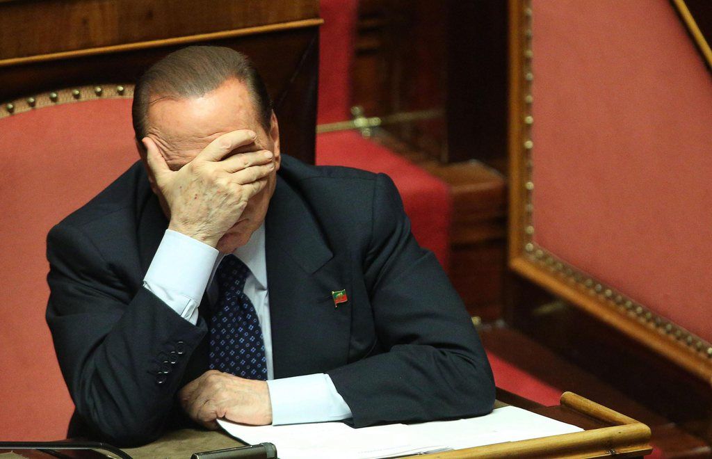 epa03896103 (FILE) A file photograph showing former Italian Prime Minister Silvio Berlusconi of the People of Freedom (PDL) party reacting at the Italian Senate, Rome, Italy, 02 October 2013. Reports state on 04 October 2013 that an Italian Senate committee has voted to expel former premier Silvio Berlusconi from the chamber after his tax fraud conviction and the decision will now go before the Italian Senate for a full vote.  EPA/ALESSANDRO DI MEO