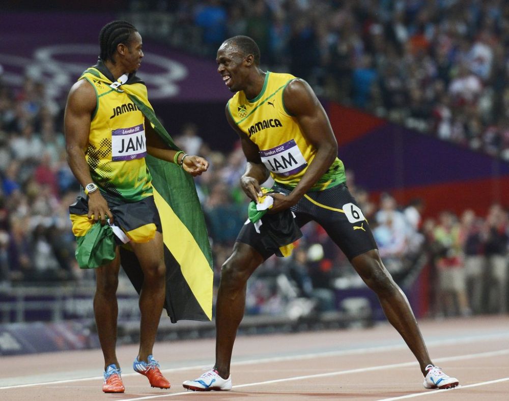 Les champions jamaïcains Yohan Blake et Usain Bolt.