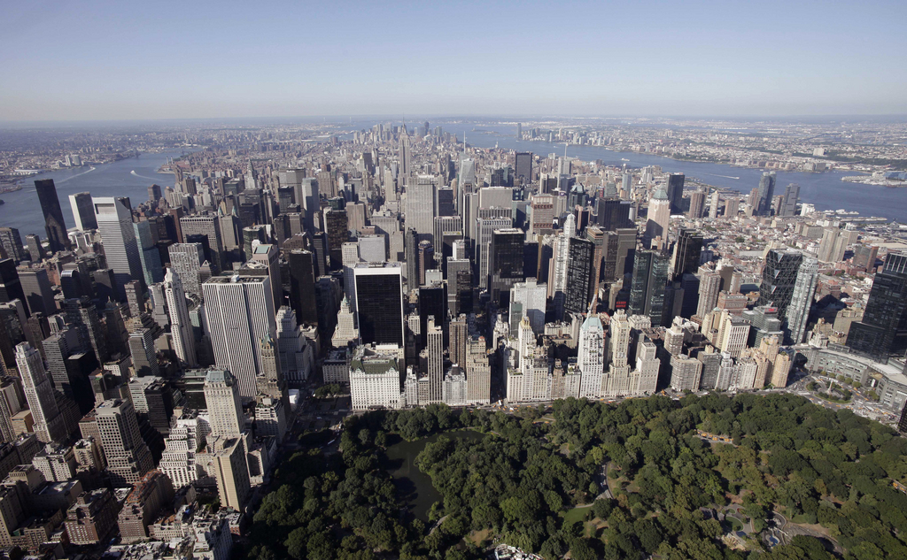 Central Park and midtown Manhattan are shown in this aerial photo of July 27, 2011 in New York. (AP Photo/Mark Lennihan)