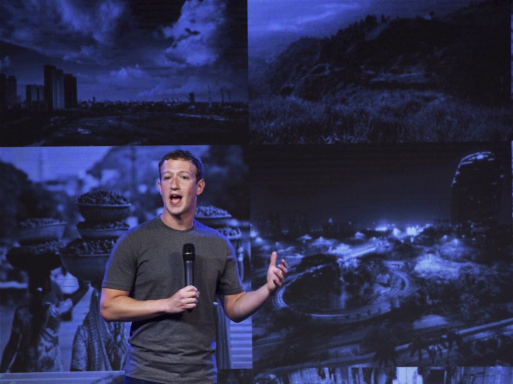Facebook CEO Mark Zuckerberg speaks at  the internet.org summit in New Delhi, India, Thursday, Oct.9, 2014. (AP Photo/Press Trust of India) INDIA OUT