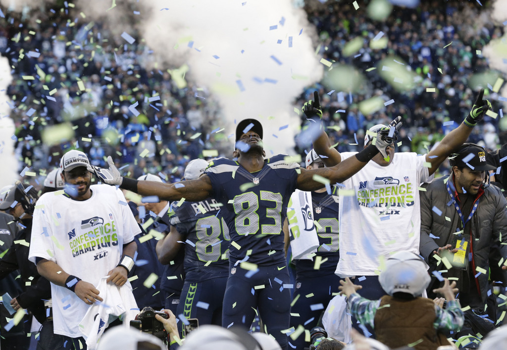 Seattle Seahawks wide receiver Ricardo Lockette (83) celebrates after an NFL football NFC Championship game against the Green Bay Packers Sunday, Jan. 18, 2015, in Seattle. The Seahawks won 28-22 to advance to Super Bowl XLIX. (AP Photo/Elaine Thompson)