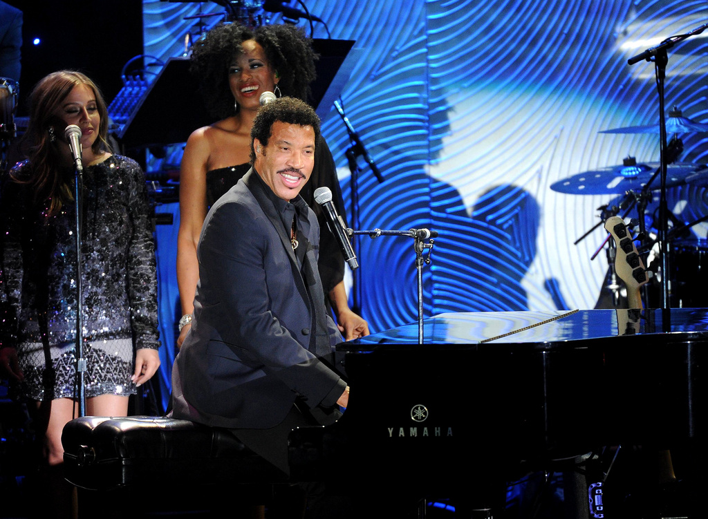 Recording artist Lionel Richie performs onstage at The 56th Annual GRAMMY Awards Salute to Industry Icons with Clive Davis, on Saturday, Jan. 25, 2014 at the Beverly Hilton Hotel in Beverly Hills, Calif. (Photo by Frank Micelotta/Invision/AP)