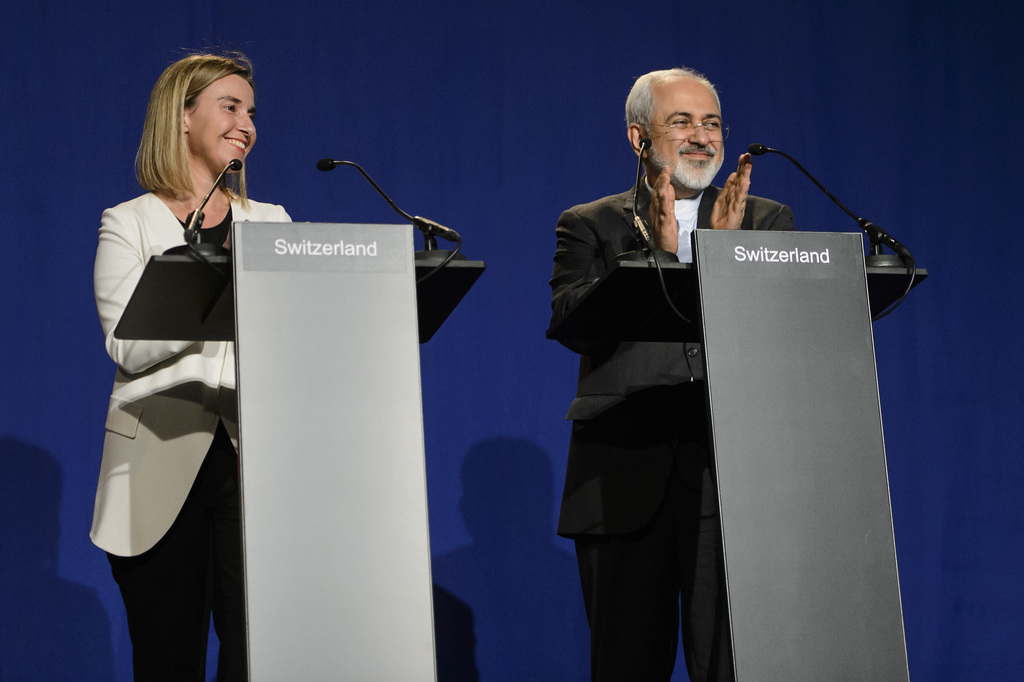EU High Representative for Foreign Affairs and Security Policy Federica Mogherini, left, and Iranian Foreign Minister Mohammad Javad Zarif, right, speaks during a press event after the end of a new round of Nuclear Iran Talks in the Learning Center at the Swiss federal Institute of Technology (EPFL), in Lausanne, Switzerland, Thursday, April 2, 2015. (KEYSTONE/Jean-Christophe Bott)