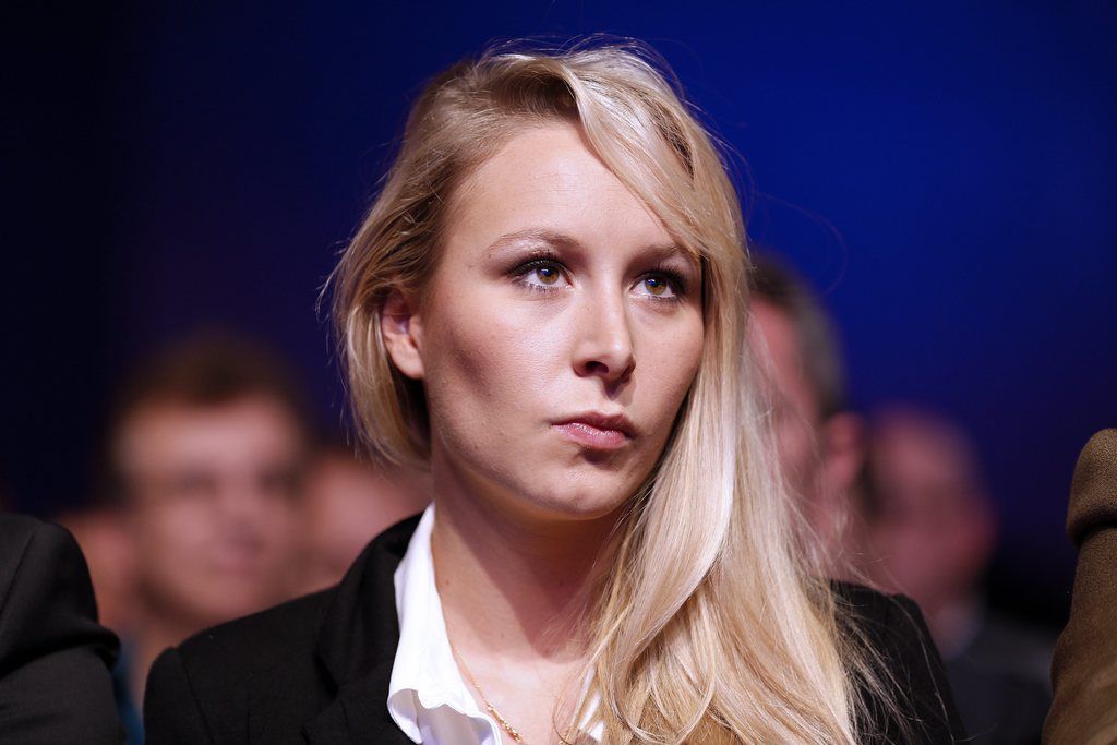 epa03954140 French right-wing party Front National (FN) deputy Marion Marechal-Le Pen attends the party's convention to prepare the 2014 Municipals elections in Paris, France, 17 November 2013.  EPA/YOAN VALAT