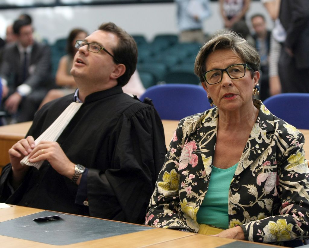 Viviane Lambert, mother of Vincent Lambert, a Frenchman who has been comatose for seven years, attends with her lawyer Jerome Triomphe a verdict about her son in the European Court of Human Rights in Strasbourg, eastern France, Friday, June 5, 2015. Europe's top human rights court has allowed doctors to stop treatment of a French man left comatose after a car accident seven years ago, a case that has drawn nationwide attention amid debate about end-of-life practices. Lambert's family members disagree on whether to keep him alive artificially. His wife wants doctors to stop life support for him but his parents disagree. (AP Photo/Christian Lutz)