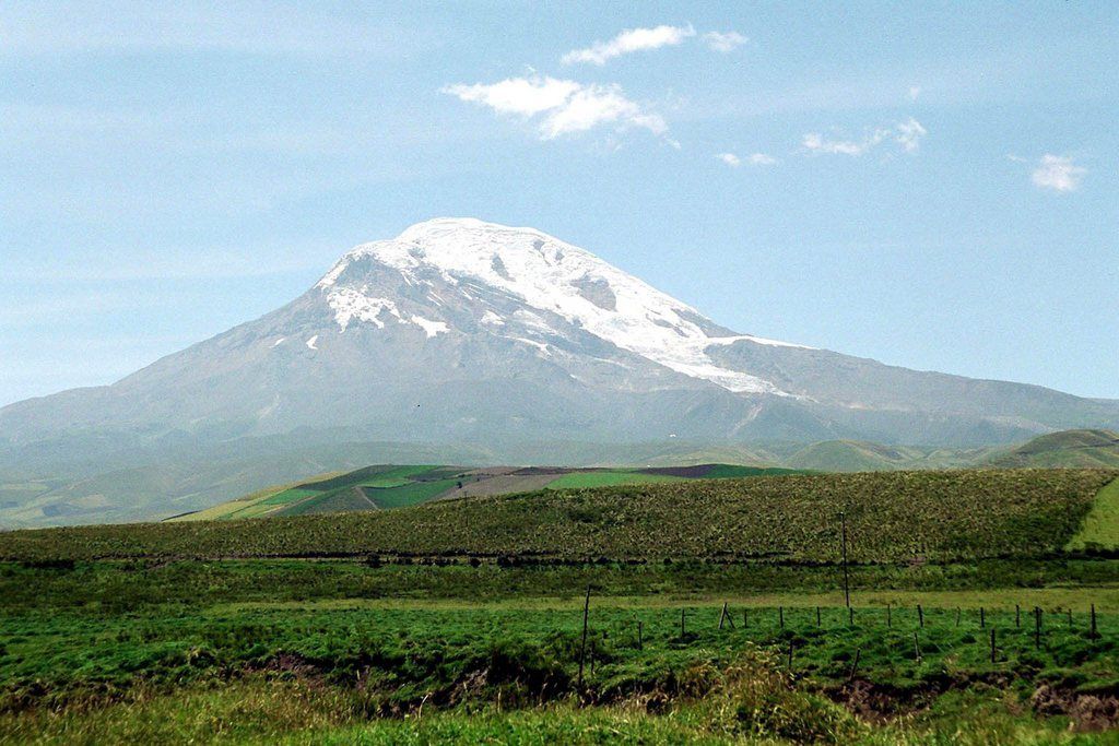 A general view of the Chimborazo peak in Ecuador, Monday, 03 November 2003. The highland regions, commonly referred to as La Sierra, is made up of ten provinces, each of which have important peaks such as Chimborazo (6,310 m), the Illinizas, Cotopaxi, Cayambe, and Antisana. Chimborazo is located in central Ecuador, in Sierra region and the capital is Riobamba. Around 3.5 million of Ecuador's 12.5 million people are indigenous, belonging to 11 distinct ethnic groups, the largest of which is the Quechua, who inhabit the country's highlands as well as the eastern Amazon jungle region. The population is predominantly rural, and agriculture is the principal economic activity. Only 10 percent of the houses in rural areas have sewage facilities and adequate hygienic services. The principle indigenous groups of the highlands are the Quichua, Canaris, and Saraguros. (KEYSTONE/ EPA/Susana Madera)