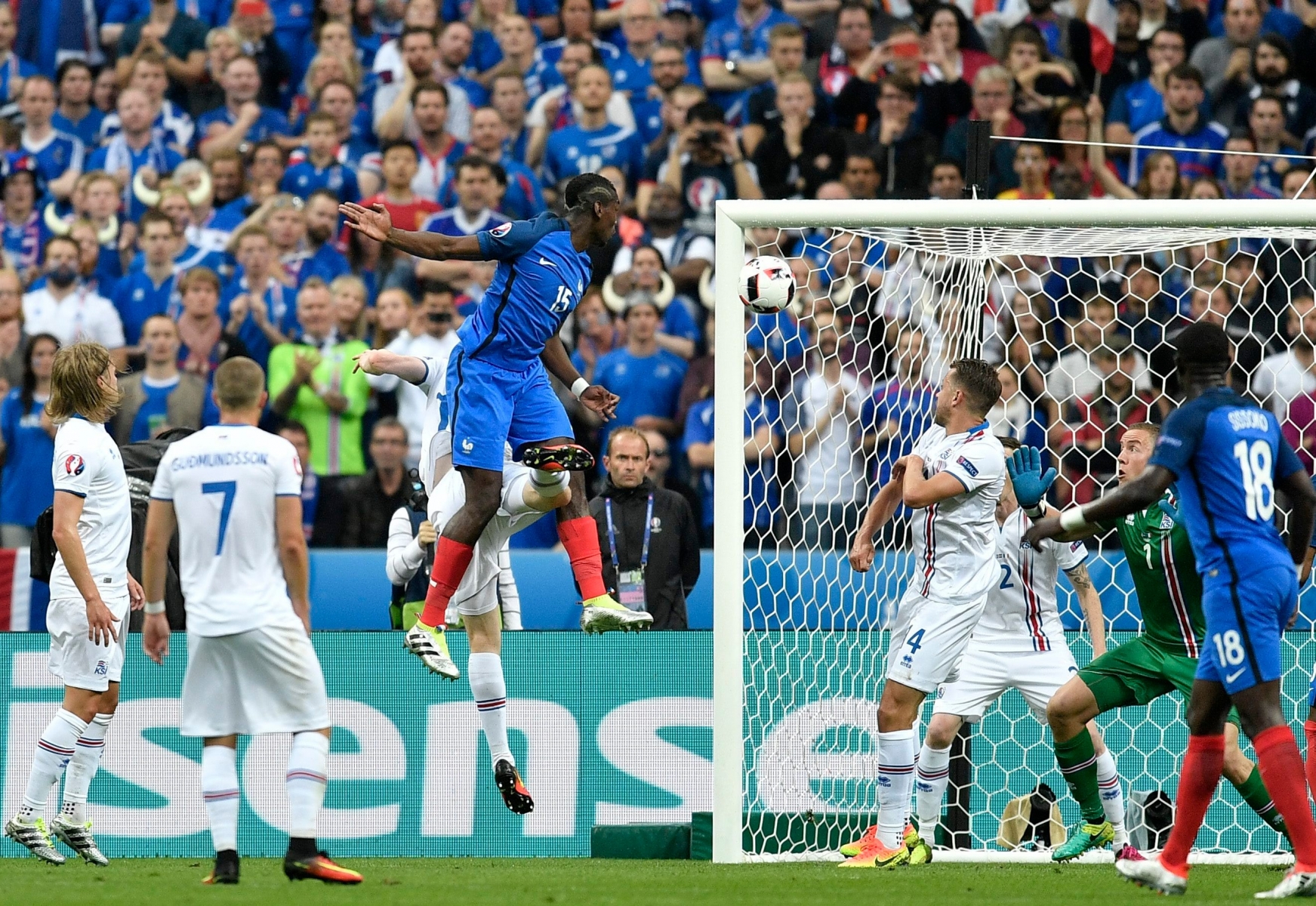 France's Paul Pogba, center, scores his sideís second goal during the Euro 2016 quarterfinal soccer match between France and Iceland, at the Stade de France in Saint-Denis, north of Paris, France, Sunday, July 3, 2016. (AP Photo/Martin Meissner) Soccer Euro 2016 France Iceland