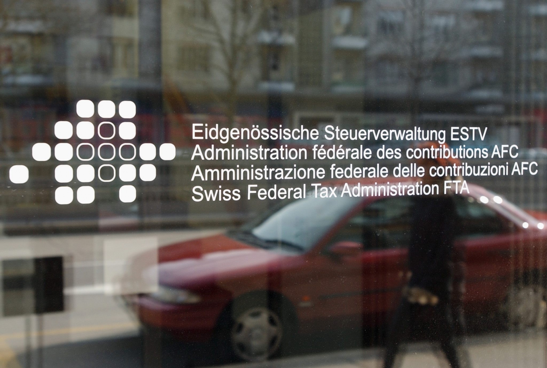 FILE ñ A file photograph showing the entrance of the Swiss federal tax administration in Bern, Switzerland, pictured on April 14, 2004. According to news on Tuesday July 05, 2016, UBS Group AG has been ordered by the Swiss tax authority to provide information related to a probe by French tax officials. (KEYSTONE/Lukas Lehmann) SWITZERLAND BANK UBS