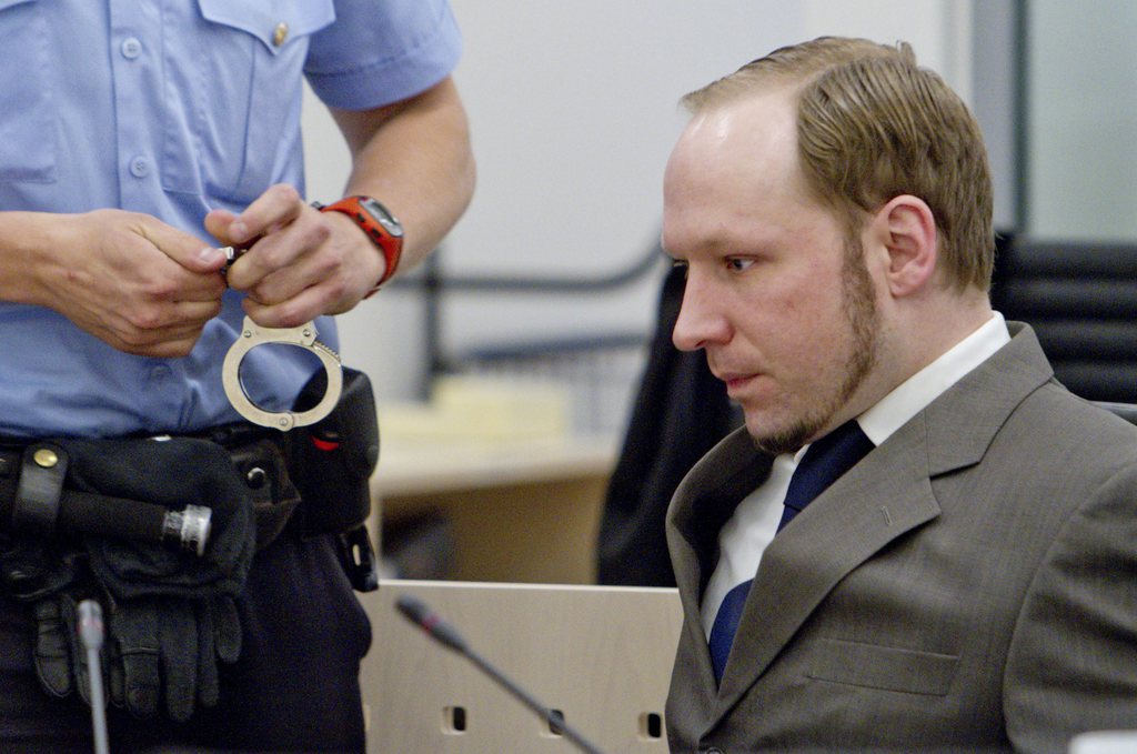 Anders Behring Breivik sits in the courtroom in Oslo, Norway, Wednesday June 6, 2012. Breivik is on trial for killing 77 people in a bomb-and-shooting rampage in Oslo last July. He has confessed to the attacks but denies criminal guilt. The trial is scheduled to continue until June 22. (AP Photo/NTB scanpix, Stian Lysberg Solum,)