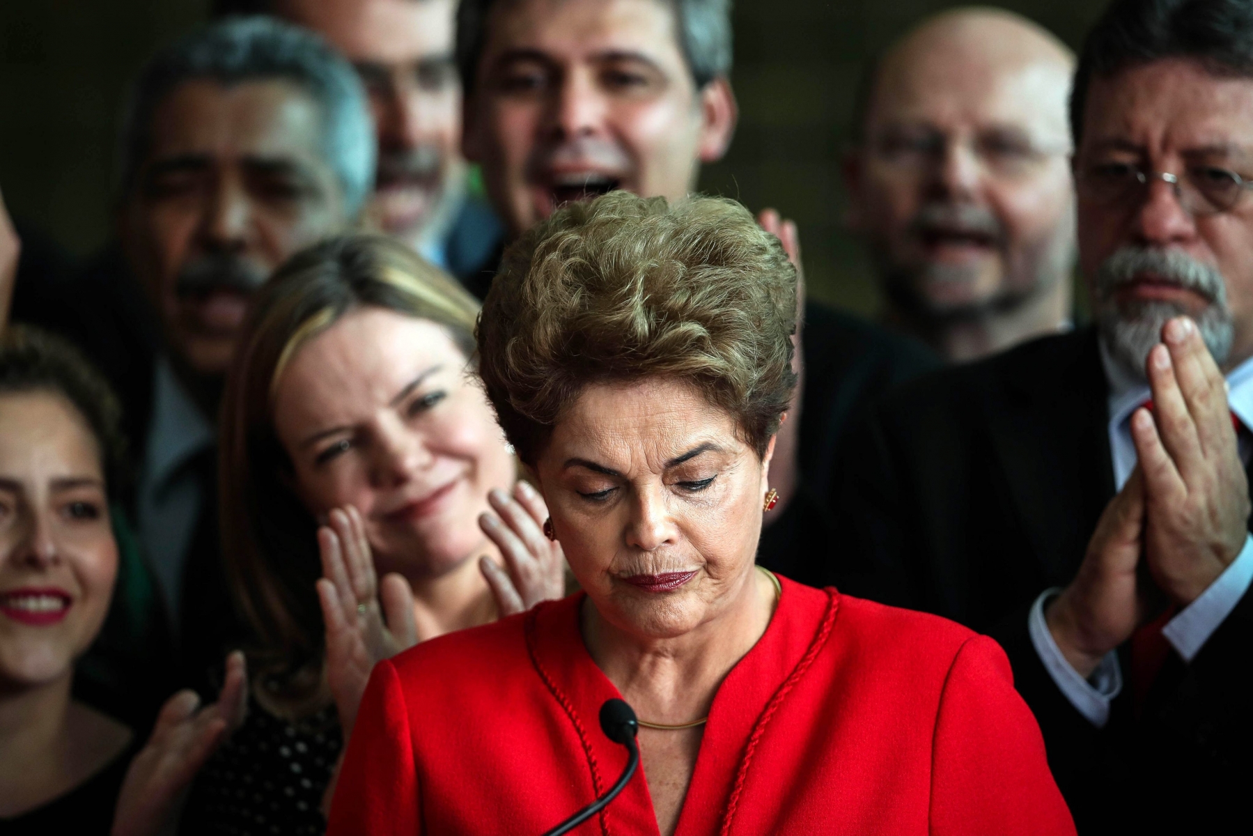 epa05517422 Former Brazilian President, Dilma Rousseff (C) delivers a statement to the press at Alborada Palace, Brasilia, Brazil, 31 August 2016. Brazil's Senate on 31 August 2016 voted to impeach Dilma Rousseff after finding her guilty of manipulating the state budget. Interim President Michel Temer will complete her mandate, which ends on 01 January 2019.  EPA/FERNANDO BIZERRA JR BRAZIL ROUSSEFF IMPEACHMENT