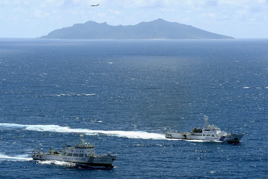 Trois navires gouvernementaux chinois sont revenus mercredi dans les eaux territoriales d'îles situées en mer de Chine orientale administrées par le Japon