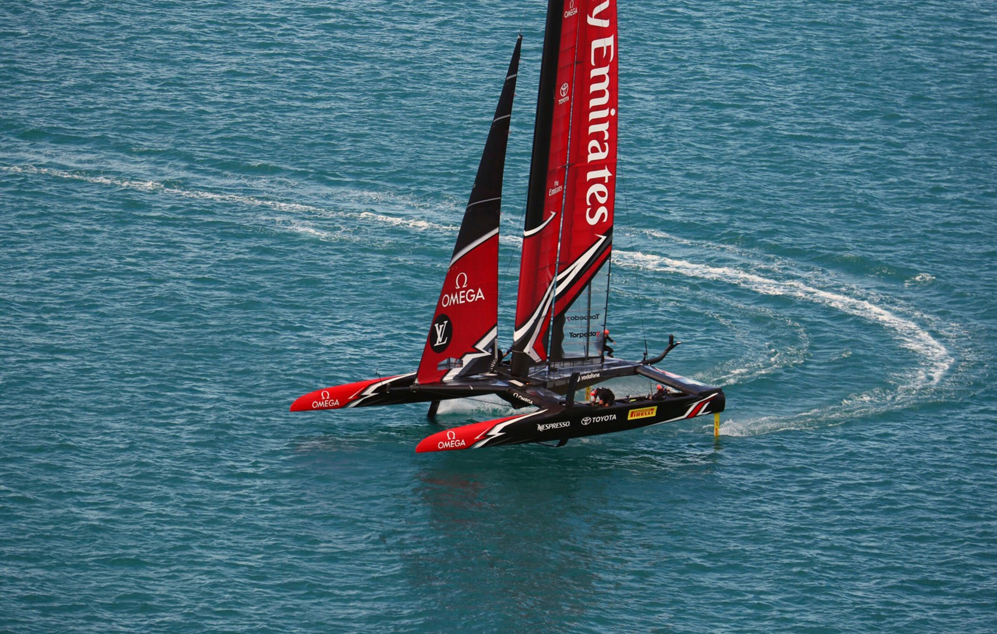 In this photo provided by the America's Cup Event Authority, Emirates Team New Zealand competes on the third day of the best-of-nine America's Cup challenger finals on Bermuda's Great Sound, Monday, June 12, 2017. (Gilles Martin-Raget/America's Cup Event Authority via AP) Americas Cup Sailing