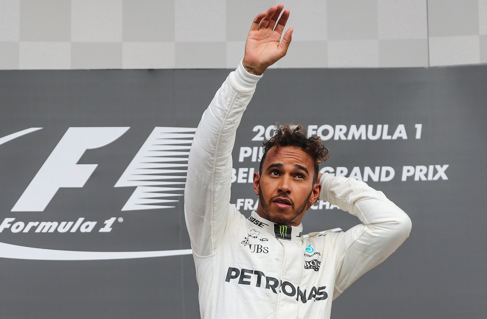 epa06166278 The winner, British Formula One driver Lewis Hamilton of Mercedes AMG GP celebrates on the podium after the 2017 Formula One Grand Prix of Belgium at the Spa-Francorchamps race track near Francorchamps, Belgium, 27 August 2017.  EPA/SRDJAN SUKI BELGIUM FORMULA ONE GRAND PRIX