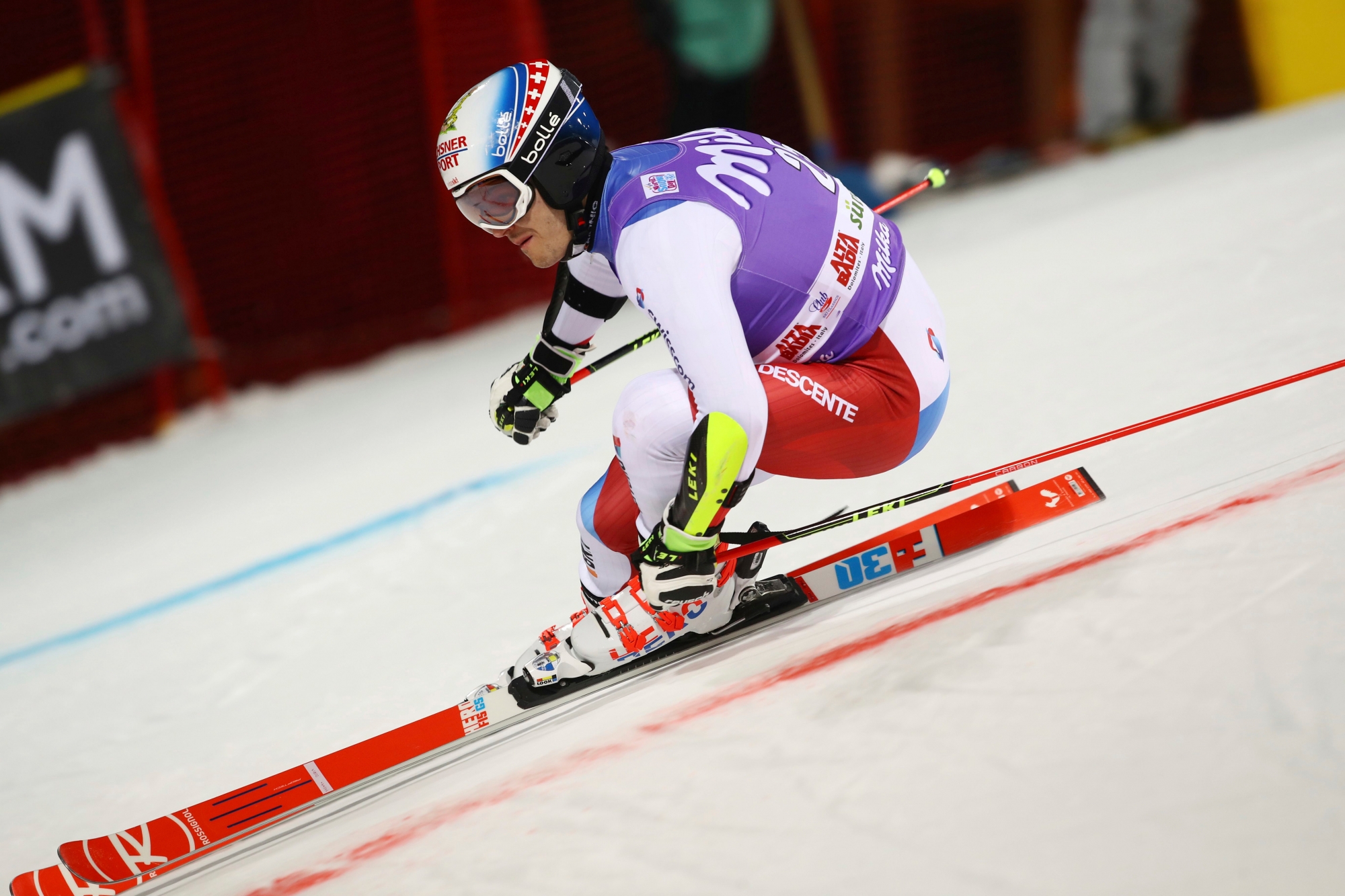 Switzerland's Loic Meillard competes during an alpine ski, men's World Cup parallel giant slalom in Alta Badia, Italy, Monday, Dec. 18, 2017. (AP Photo/Alessandro Trovati) Italy Alpine Skiing World Cup