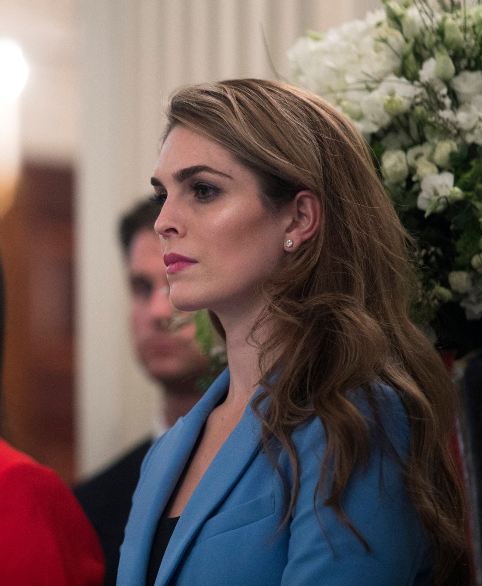 epa06571489 (FILE) - White House Communications Director Hope Hicks (R) listens to remarks during a listening session hosted by US President Donald J. Trump with high school students and teachers in the State Dining Room of the White House in Washington, DC, USA, 21 February 2018 (issued 28 February 2018). A day after testifying in the Russia probe, one of President Trump's advisers, Hope Hicks, said she plans to resign as White House Communications Director.  EPA/SHAWN THEW (FILE) USA HOPE HICKS