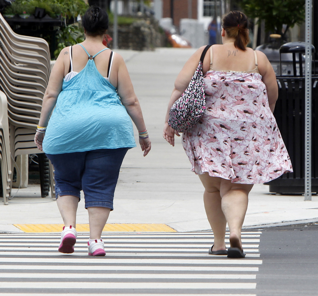 Pour les personnes obèses seules, de meilleures chances de trouver un(e) partenaire pourrait s'ajouter aux autres bénéfices de l'opération. (Illustration)