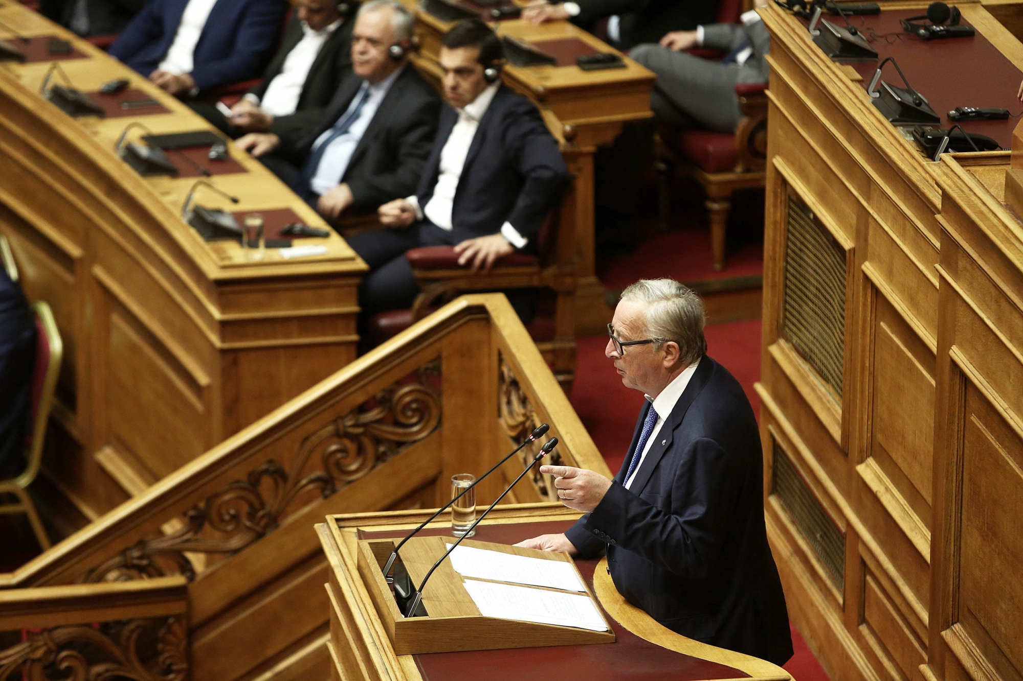 epa06693901 European Commission President, Jean-Claude Juncker speaks to lawmakers during a plenary session at the Greek Parliament in Athens, Greece, 26 April 2018. Juncker is on an official visit to Athens.  EPA/SIMELA PANTZARTZI GREECE EU JUNCKER