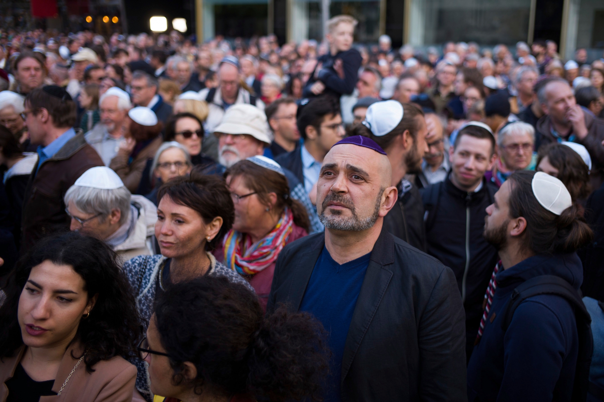 People wear Jewish skullcaps, during a demonstration against anti-Semitism in Berlin, Wednesday, April 25, 2018. (AP Photo/Markus Schreiber) Germany Anti Semitism