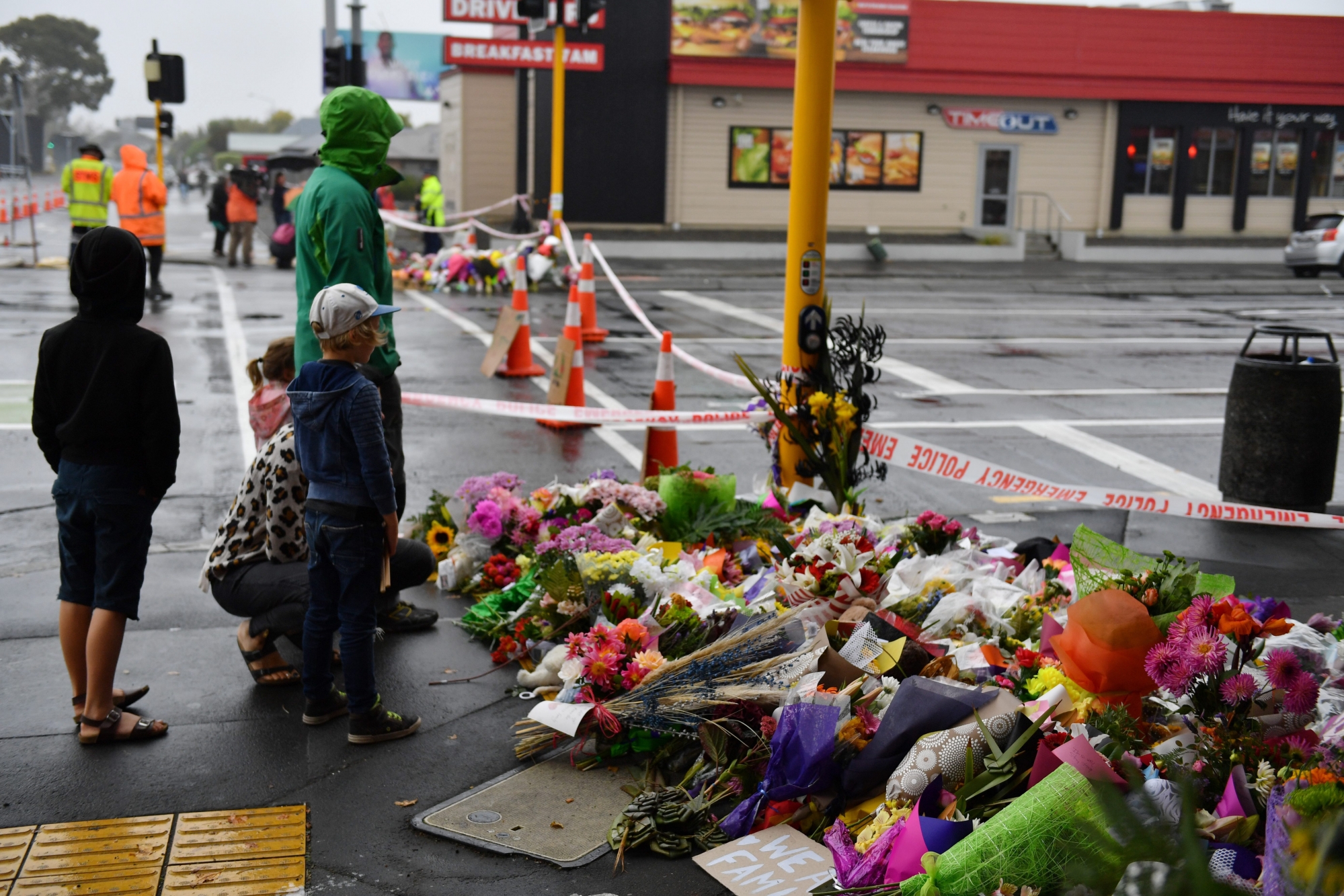 epaselect epa07443806 Members of the public place flowers at a makeshift memorial near the Linwood Mosque in Christchurch, New Zealand, 17 March 2019. A gunman killed 50 worshippers and injured 50 more at the Al Noor Masjid and Linwood Masjid on 15 March, 28-year-old Australian man, Brenton Tarrant, has appeared in court on 16 March and charged with murder.  EPA/MICK TSIKAS  AUSTRALIA AND NEW ZEALAND OUT epaselect NEW ZEALAND CHRISTCHURCH MOSQUE SHOOTING