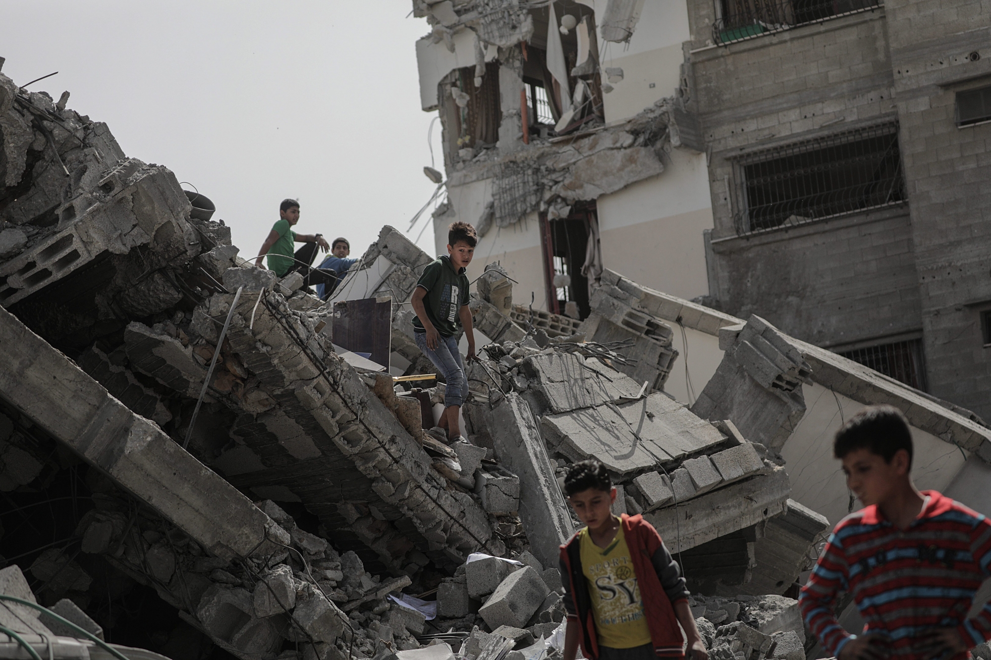epa07550717 Palestinians inspect the rubble of adestroyed house which was damaged in Israeli air strikes in Gaza City, 06 May 2019. According to local media reports in Gaza: both sides had agreed on a ceasefire, assisted by Egypt, the United Nations (UN) and Qatar. However, the Israel Defense Forces (IDF) has not yet commented on any ceasefire. IDF said Militant groups from Gaza, fired some 690 rockets into southern Israel during the past 48 hours - 240 of which had been intercepted by the country's Iron Dome missile defense system. At least four Israelis were killed. In response, Israel had targeted 350 sites belonging to Hamas and Islamic Jihad and 23 Palestinians were killed.  EPA/MOHAMMED SABER MIDEAST ISRAEL PALESTINIANS GAZA CONFLICT AFTERMATH