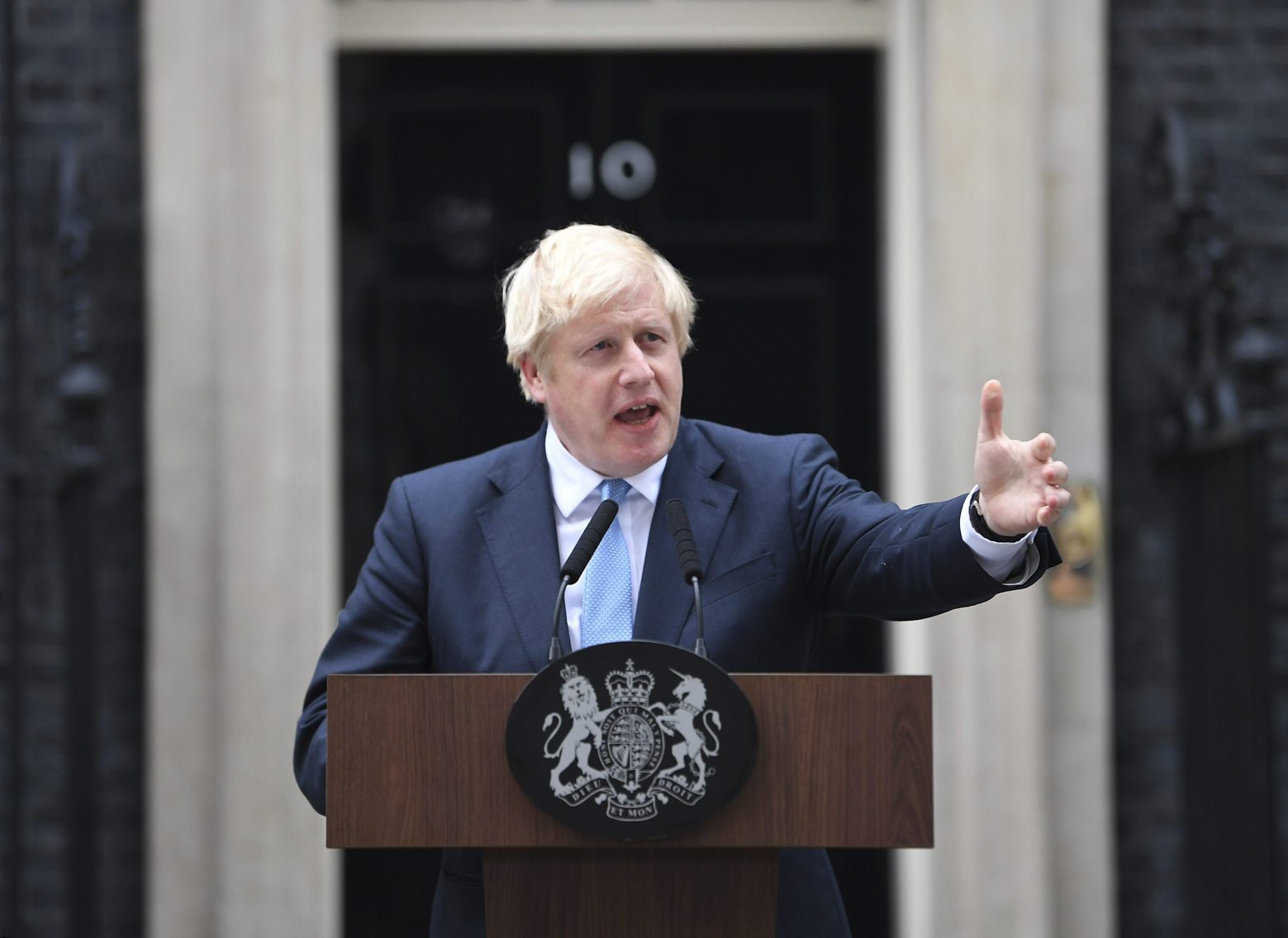 Britain's Prime Minister Boris Johnson speaks to the media outside 10 Downing Street in London, Monday, Sept. 2, 2019. Johnson says chances of a Brexit deal are rising  (Victoria Jones/PA via AP) Britain Brexit