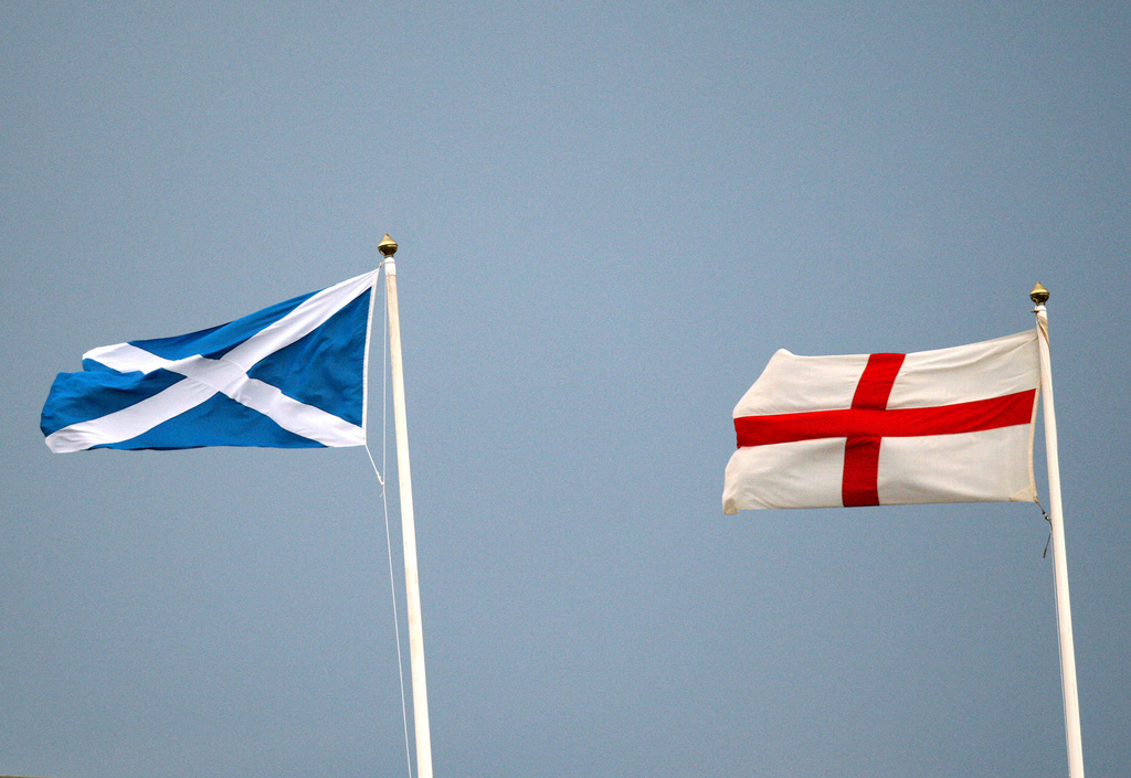 A general view of a Saltire flag, and St Georges cross flying ahead of the Six Nations rugby union international match between Scotland and England at Murrayfield, Edinburgh, Scotland, Saturday Feb. 4, 2012. (AP Photo/Scott Heppell)