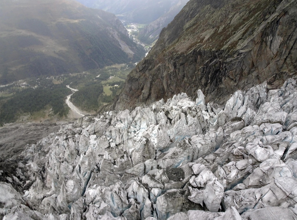 epa07868584 A handout photo made available by the Aosta Valley Region's Press Office shows the Planpincieux glacier on the Grandes Jorasses on the Italian side of the Mont Blanc massif, issued 25 September 2019. A radar system is being installed to constantly monitor the glacier, which is in danger of collapsing. Local authorities are taking precautionary measures because a block of 250,000 cubic metres of ice could break away from the glacier. The Valle d'Aosta regional government and the Fondazione Montagna Sicura (Safe Mountain Foundation) raised the alarm after seeing the glacier's movement accelerate to 50-60cm a day. EPA/AOSTA VALLEY REGION PRESS OFFICE HANDOUT HANDOUT EDITORIAL USE ONLY/NO SALES
