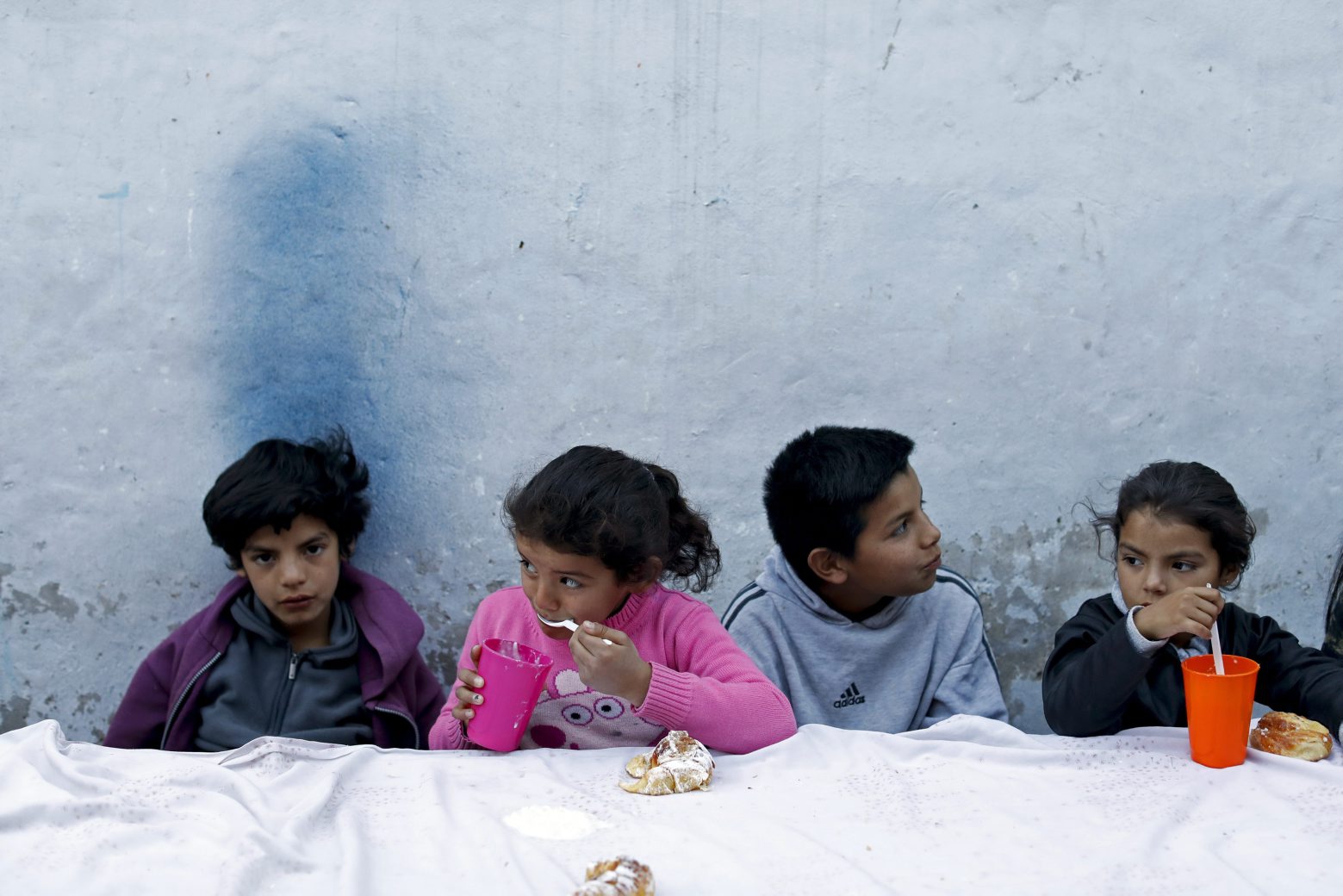 Children eat at a soup kitchen on the outskirts of Buenos Aires, Argentina, Tuesday, Sept. 17, 2019. Lawmakers passed a food emergency bill aimed to boost soup kitchens around the country amid food price hikes. (AP Photo/Natacha Pisarenko) Week That Was from Latin America Photo Gallery