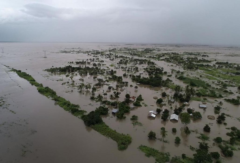 This photo issued Tuesday March 19, 2019, taken within last week and supplied by World Food Programme, flood waters cover large tracts of land in Nicoadala, Zambezia Province of Mozambique. Rapidly rising floodwaters have created "an inland ocean" in the country endangering many thousands of families, as aid organizations scramble to rescue and provide food to survivors of Cyclone Idai. (Photo World Food Programme via AP)