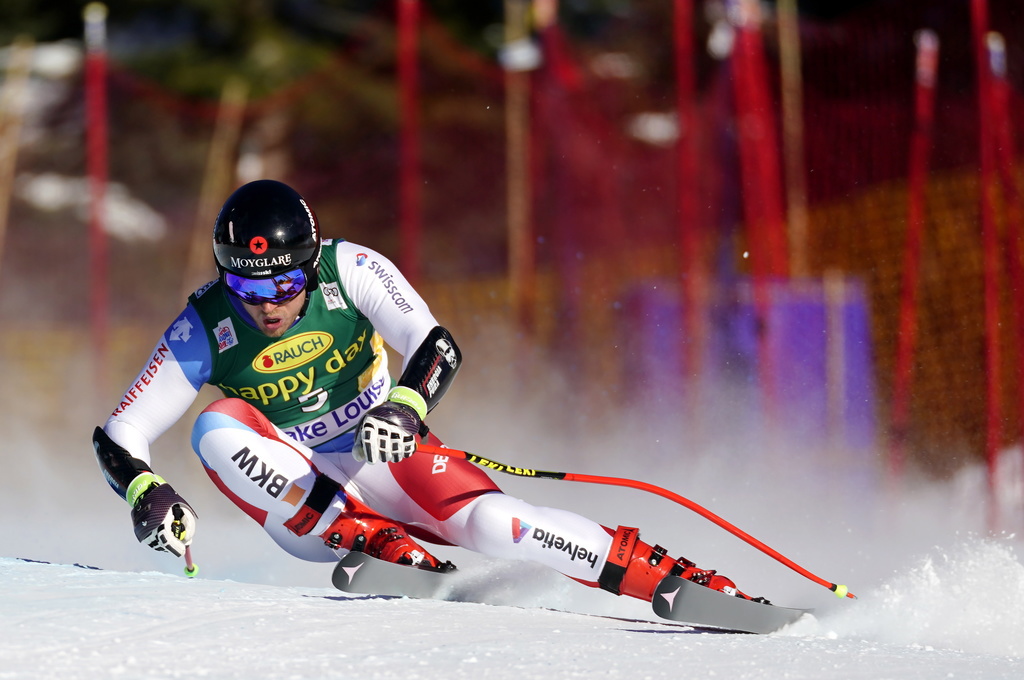 Mauro Caviezel, of Switzerland, skis down the course during the men's World Cup downhill ski race in Lake Louise, Alberta, Sunday, Dec. 1, 2019. (Frank Gunn/The Canadian Press via AP)