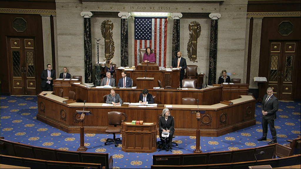 Debate continues on the floor of the House of Representatives on the articles of impeachment against President Donald Trump at the Capitol in Washington, Wednesday, Dec. 18, 2019. (House Television via AP)