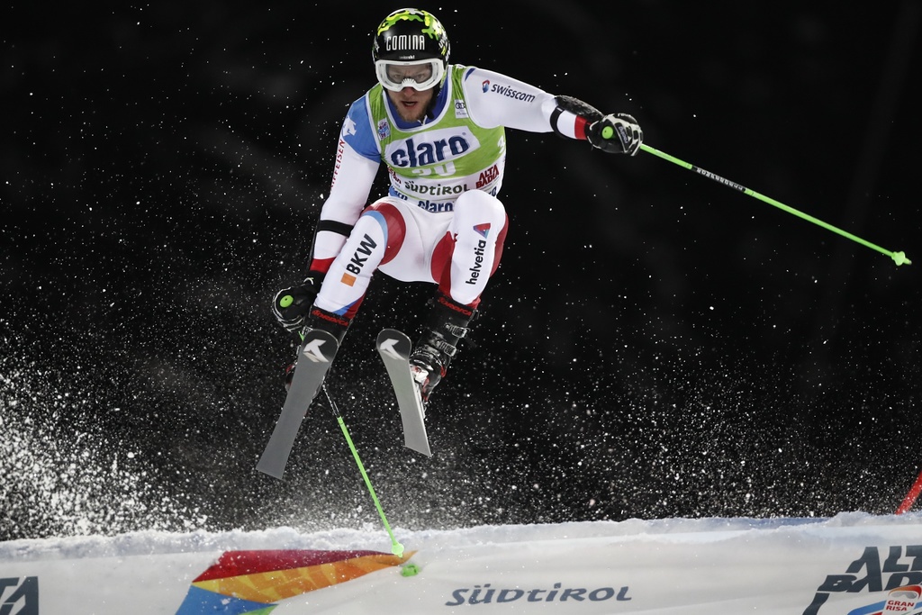 Switzerland's Justin Murisier competes during an alpine ski, men's World Cup parallel giant slalom, in Alta Badia, Italy, Monday, Dec. 23, 2019. (AP Photo/Gabriele Facciotti)