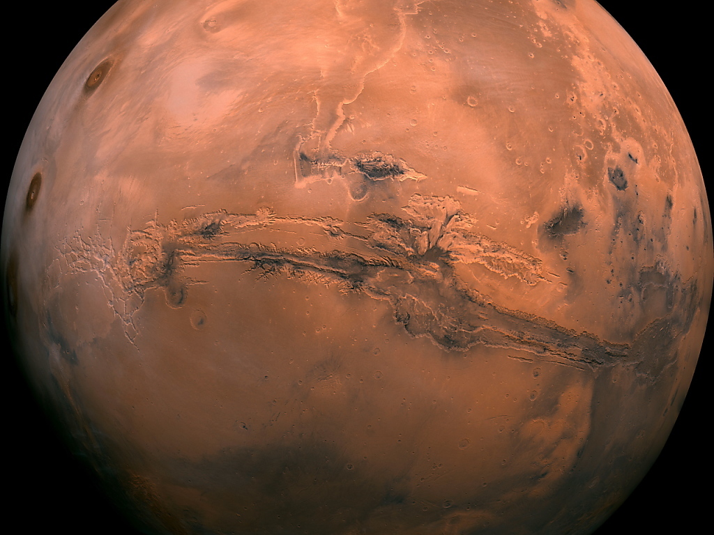 Certains reliefs de la planète Mars que l'on a interprétés comme étant le fait d'anciennes coulées de lave pourraient tout aussi avoir été façonnés par de la boue (archives).